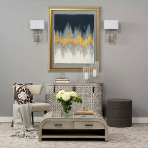 Mercana Beacon Round Ottoman: Plush Chic Seating with Glam Metal Accents for Modern Living Spaces Gray Fabric 50272