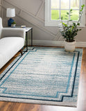 Unique Loom Oasis Fountain Machine Made Border Rug Blue, Ivory/Navy Blue/Gray 7' 1" x 10' 0"