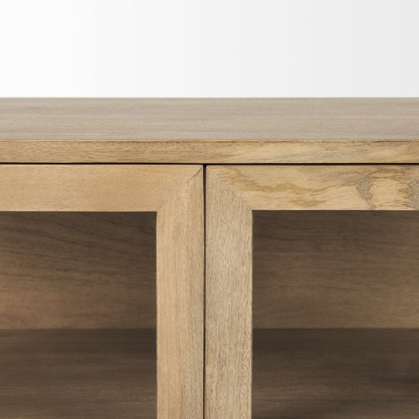 Mercana Arelius Sculptural Accent Cabinet with Glass Doors, Solid Wood & Metal Base for Modern Interiors Light Brown Wood | Black Metal 69226