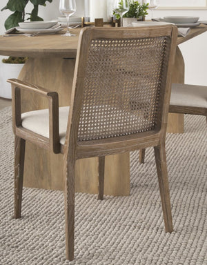 Mercana Clara Armless Dining Chair with Woven Cane Back and Cushioned Seat for Coastal and Boho Spaces Cream Fabric | Brown Wood 69351