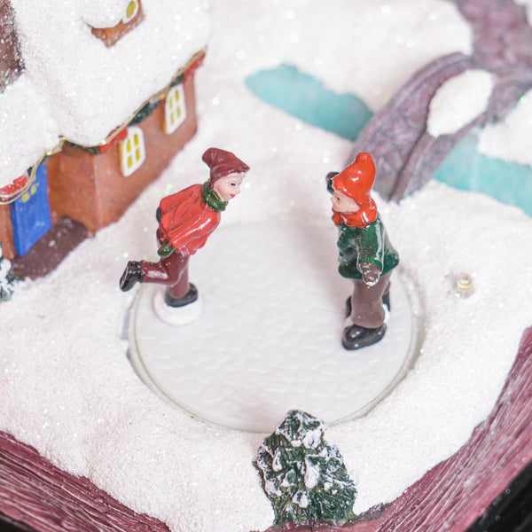 English Elm Homcom Illuminated Musical Christmas Village With Led Lights, Skaters & Open Bible Base Decor W2225P249704