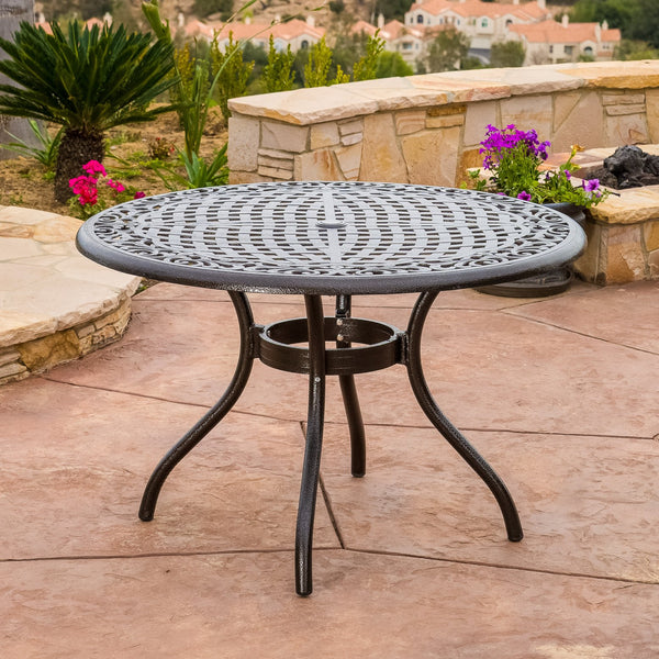 English Elm Christopher Knight Home® - PHOENIX Cast Aluminum 48in Round Patio Dining Table with Lattice Scrollwork and Umbrella Hole Bronze 49.25 L x 49.25 W x 5.25 H 54588.00BZE