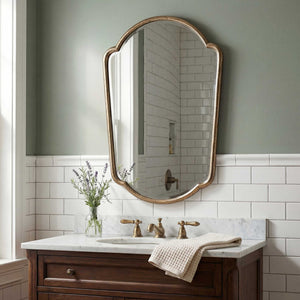 Uttermost Naomi Cast Aluminum Wall Mirror with Curved Antique Brass Finish for Any Room