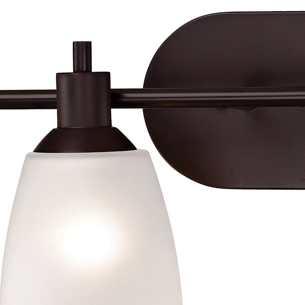 Thomas Lighting Jackson Three Light Vanity Bar with Frosted Tulip Shades in Oil Rubbed Bronze Finish 31 W x 7 D x 9 H 1354BB/10