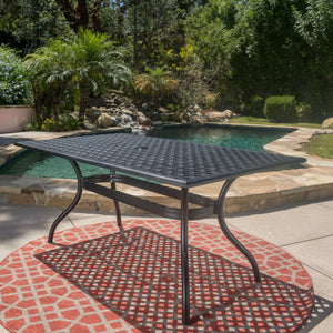 English Elm Christopher Knight Home® - CAYMAN Rectangle Table Black Cast Aluminum Outdoor Dining Table with Lattice Top, Umbrella Hole, Seats Six 56955.00
