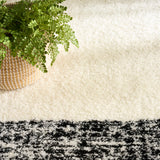 Nourison Pacific Shag PCS02 Machine Made Power-loomed Solid Border Indoor Only Shag Modern Rug Ivory Black, Ivory Black Pile, 100% Polyester 841491148884