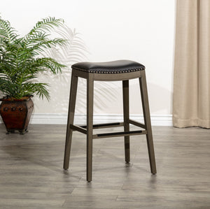 English Elm 30" Bar Height Saddle Stool, Weathered Gray Finish, Black Leather Seat