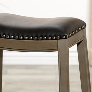 English Elm 24" Counter Height Saddle Stool Weathered Gray with Black Bonded Leather Seat & Nailhead Trim Durable Hardwood Frame B046109806