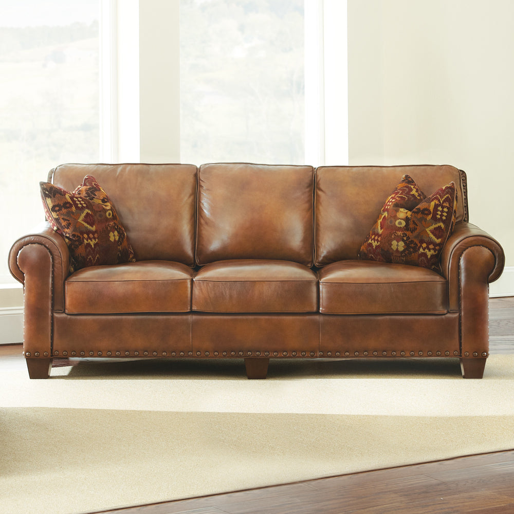 English Elm Steve Silver - Rustic Leather Sofa Tan — Top-Grain Upholstery, Eight-Way Hand-Tied Springs, Nailhead Trim, Cozy Pillows B081109574