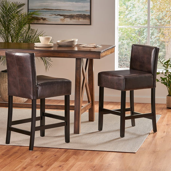 English Elm Christopher Knight Home® - 26-inch Brown Leather Counter Stools Set of 2 — Bonded Leather Seats, Ergonomic Back, Rubberwood Legs, Easy-Clean 73723.00PU