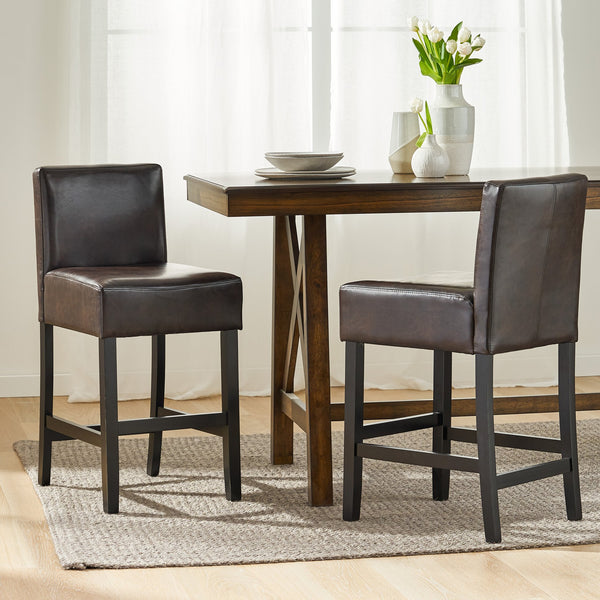 English Elm Christopher Knight Home® - 26-inch Brown Leather Counter Stools Set of 2 — Bonded Leather Seats, Ergonomic Back, Rubberwood Legs, Easy-Clean 73723.00PU