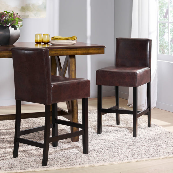 English Elm Christopher Knight Home® - 26-inch Brown Leather Counter Stools Set of 2 — Bonded Leather Seats, Ergonomic Back, Rubberwood Legs, Easy-Clean 73723.00PU