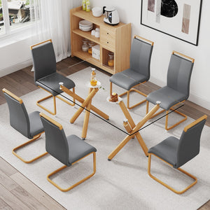 Hearth and Haven 1 Table and 6 Chairs. Glass Dining Table with 0.39 "Tempered Glass Tabletop and Wooden Metal Legs. Grey Leatherette Leather High Backrest Soft Padded Side Chair with Wooden Color C-Shaped Tube Chrome Metal Leg W1151S00687