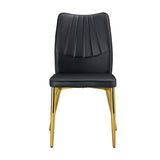 English Elm Four Black Dining Chairs. A Medieval Modern Chair Made Of Pu Material With Soft Cushions, Equipped With Golden Metal Legs. Suitable For Restaurants and Living Rooms