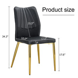 English Elm Four Black Dining Chairs. A Medieval Modern Chair Made Of Pu Material With Soft Cushions, Equipped With Golden Metal Legs. Suitable For Restaurants and Living Rooms