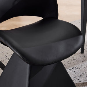 English Elm The Swivel Dining Chair with Hollow Cutout Back Faux Leather Hardwood Frame Modern Black W3612P436510