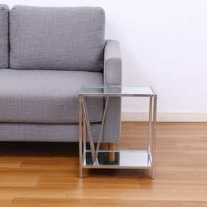 HomeRoots 24" Silver Mirrored Glass End Table with Stylish Iron Frame & Lower Shelf for Elegant Storage 274431