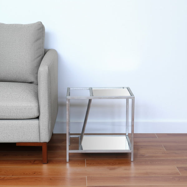 HomeRoots 24" Silver Mirrored Glass End Table with Stylish Iron Frame & Lower Shelf for Elegant Storage 274431