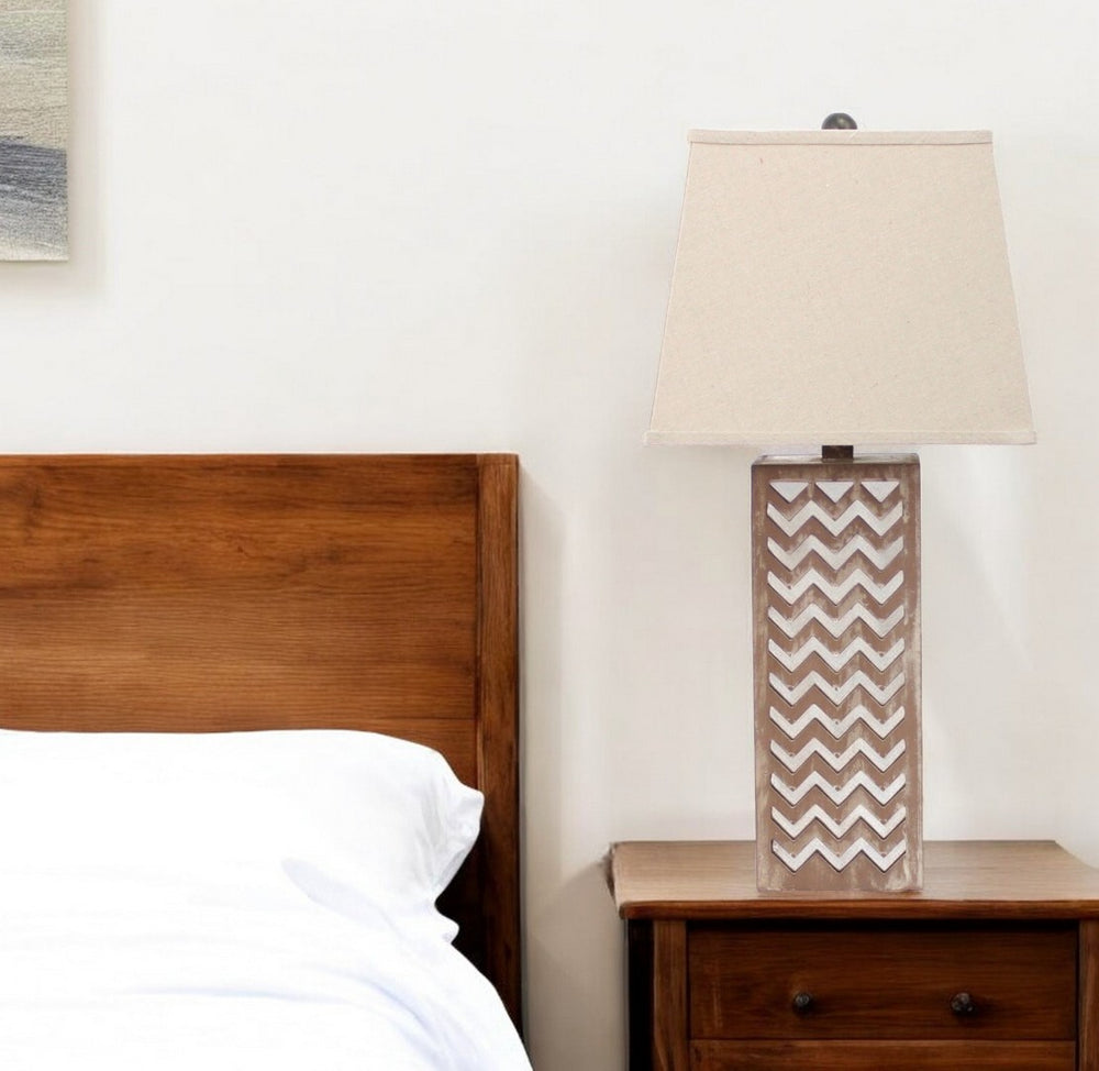 HomeRoots 28" Distressed Natural and Silver Metal Bedside Lamp with Beige Cone Shade for Cozy Lighting Decor 274468