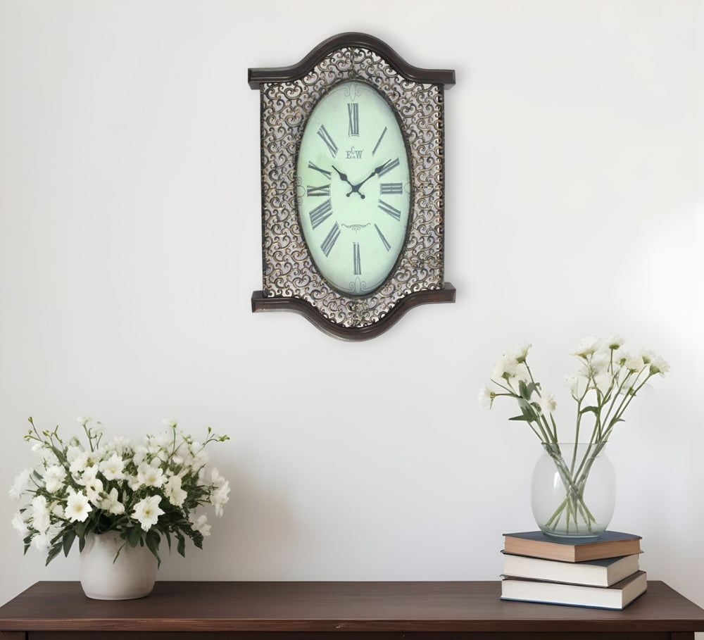 HomeRoots 20" Oval Antiqued Bronze Wall Clock - Vintage Elegance with Wood Accents for Timeless Style Brown 274496