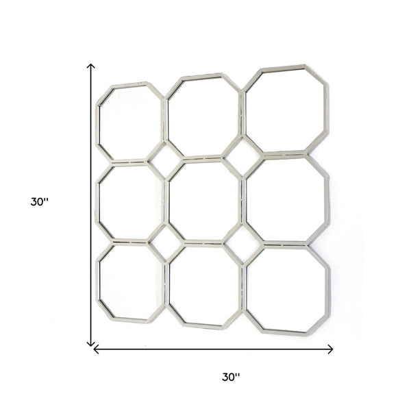 HomeRoots 30" Silver Mirrored Metal Wall Sculpture - Modern Geometric Art for Stunning Home Décor & Elegance 274599