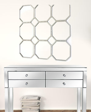 HomeRoots 30" Silver Mirrored Metal Wall Sculpture - Modern Geometric Art for Stunning Home Décor & Elegance 274599