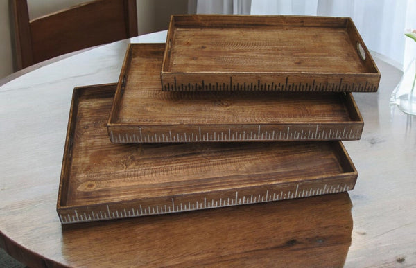 HomeRoots Set of Three Rustic Brown Wood Nesting Serving Trays with Cutout Handles for Stylish Display 274824
