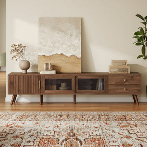 English Elm 76" Modern Minimal TV Stand with Waveform Glass Doors, Soft-Close Drawers, Cable Management, Solid Wood Legs (Fits TVs up to 85") N710P298234P