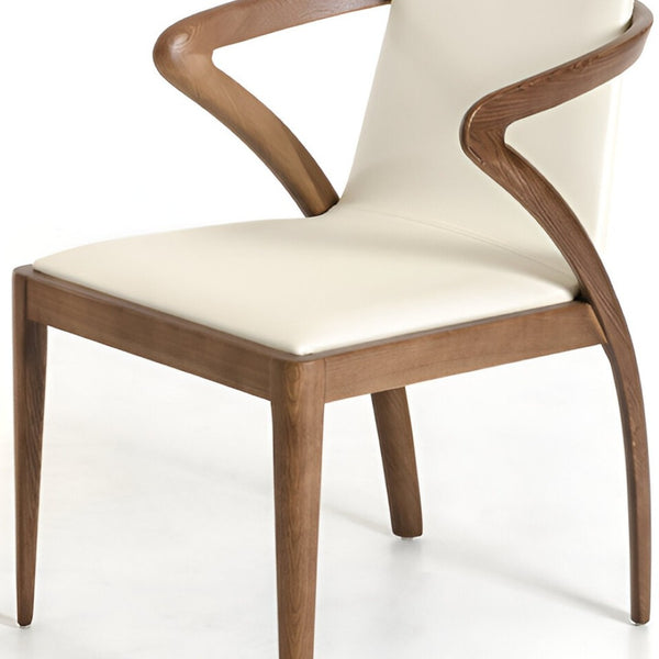 HomeRoots Cream Upholstered Faux Leather Dining Arm Chair with Brown Wood Legs - Comfort & Style for Any Space 282996