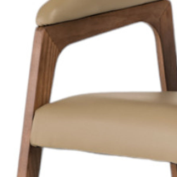 Homeroots Taupe And Brown Upholstered Faux Leather Curved Back Dining Arm Chair  Wood 283002