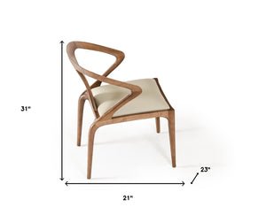 Homeroots White And Brown Upholstered Faux Leather Curved Back Dining Side Chair  Wood 283010