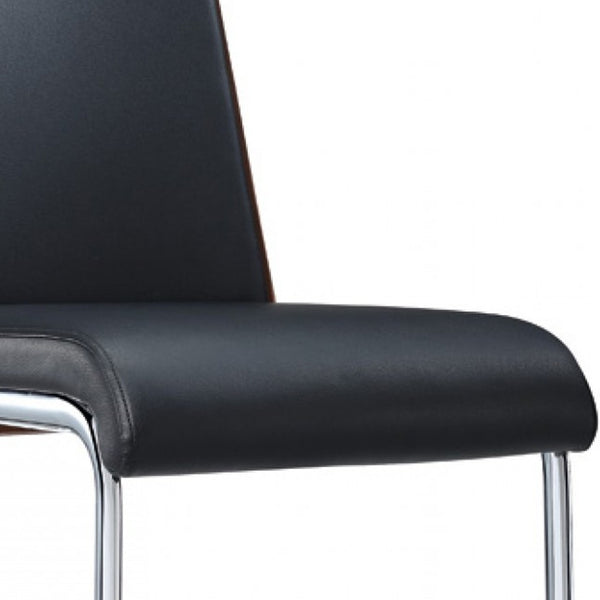 Homeroots Set Of Two Black And Silver Upholstered Faux Leather Dining Parsons Chairs  Metal 283199