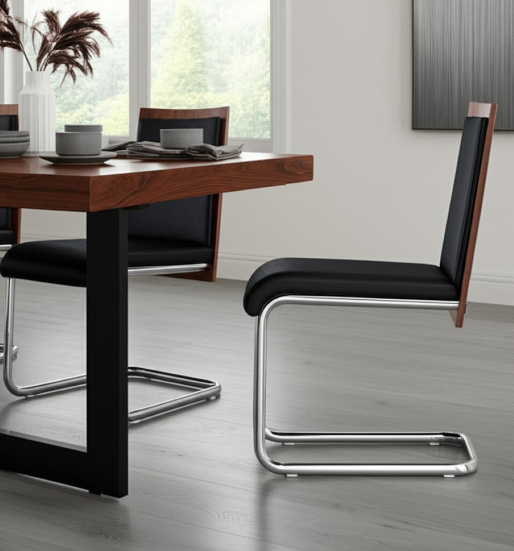 HomeRoots Set of Two Stylish Black Faux Leather Dining Chairs with Modern Silver Legs for Any Space 283199