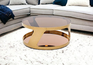 Homeroots 15" Gold Steel And Glass Round Coffee Table   283454