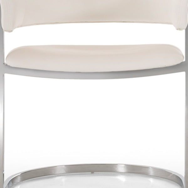 Homeroots White And Silver Upholstered Faux Leather Wing Back Dining Arm Chair White Metal 284244