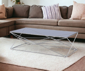 Homeroots 18" Smoked Glass And Stainless Steel Coffee Table   284288