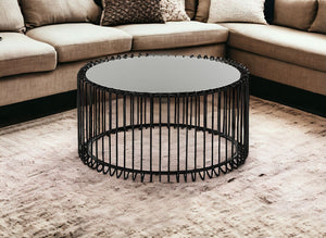 Homeroots 19" Black Metal And Glass Round Coffee Table   284312