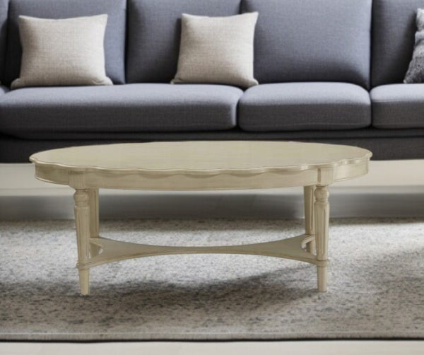 HomeRoots 50" Antiqued White Oval Coffee Table - Distressed Solid Wood Centerpiece for Rustic Farmhouse Decor 286349