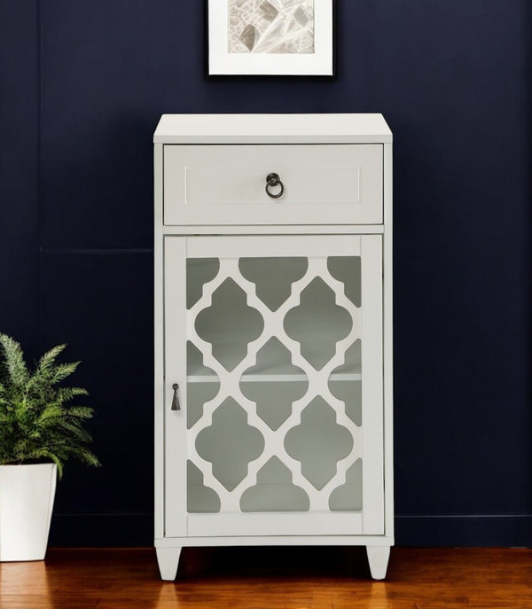 HomeRoots 17" Fret Work Design Glass Door Accent Cabinet - Chic Storage Solution for Any Room's Decor White 286452