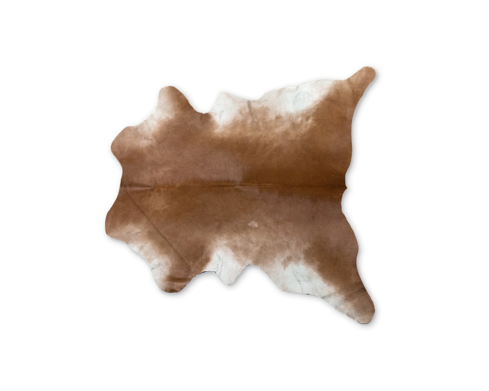 HomeRoots 2' X 3' Tan Print Cowhide Area Rug - Handcrafted Unique Accent for Cozy Living Spaces & Style 293166