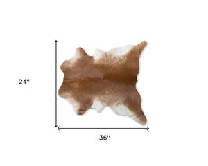 HomeRoots 2' X 3' Tan Print Cowhide Area Rug - Handcrafted Unique Accent for Cozy Living Spaces & Style 293166