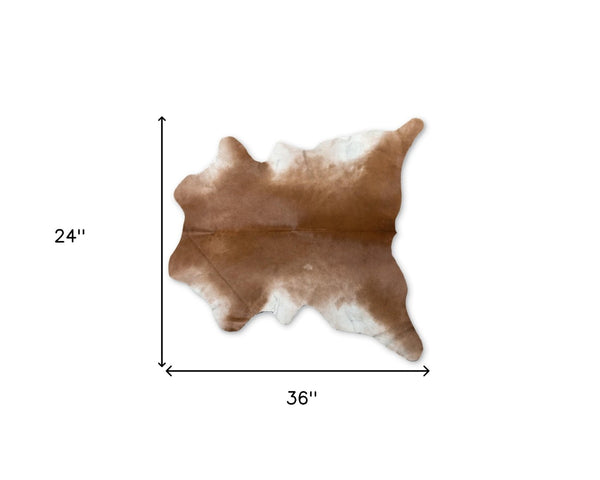 HomeRoots 2' X 3' Tan Print Cowhide Area Rug - Handcrafted Unique Accent for Cozy Living Spaces & Style 293166