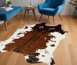 Homeroots 4' X 5' Faux Cow Hide Brown And White Area Rug Brownsville Chocolate,White Faux Leather 294239