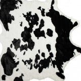 Homeroots 4' X 5' Black And White Faux Cowhide Animal Print Area Rug Sugarland Black,White Faux Cowhide 294242