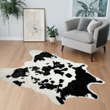 Homeroots 4' X 5' Black And White Faux Cowhide Animal Print Area Rug Sugarland Black,White Faux Cowhide 294242