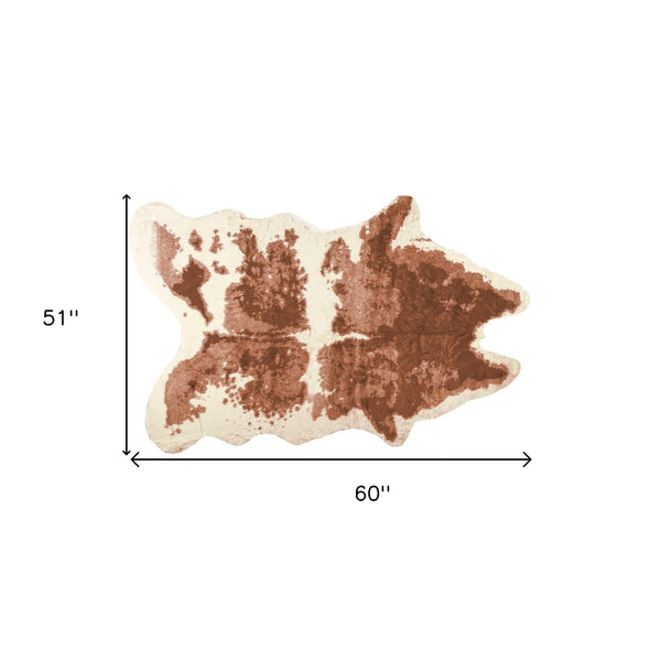 Homeroots 4' X 5' Brown And Ivory Faux Cowhide Animal Print Printed Area Rug  Faux Cowhide 294243