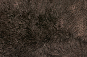 Homeroots 24" X 36" Chocolate Single Sheepskin Area Rug Chocolate Genuine Sheepskin 294266
