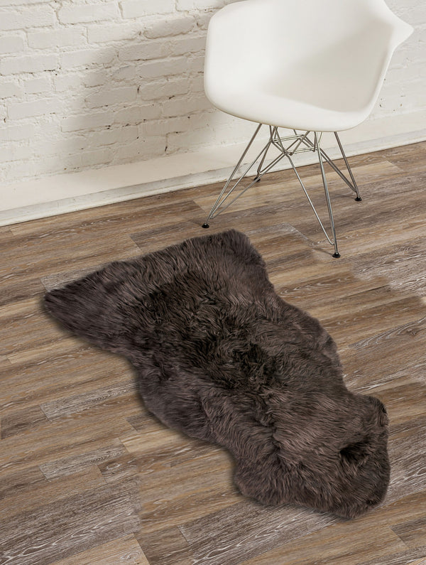 Homeroots 24" X 36" Chocolate Single Sheepskin Area Rug Chocolate Genuine Sheepskin 294266