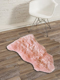 Homeroots 24" X 36" X 1.5" Pink Single Sheepskin - Area Rug Pink Genuine Sheepskin 294267