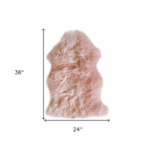 Homeroots 24" X 36" X 1.5" Pink Single Sheepskin - Area Rug Pink Genuine Sheepskin 294267